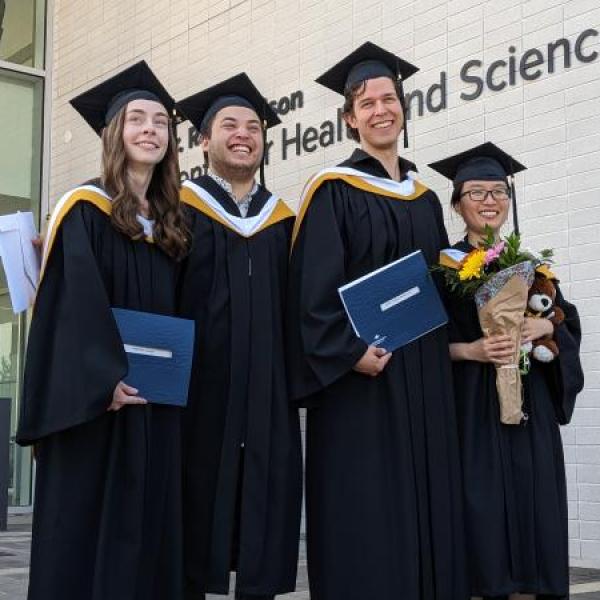 Four VIU chemistry graduates at convocation. Links to the Chemistry Program outline at https://scitech.viu.ca/chemistry/programs.
